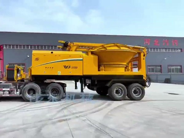 WD3600 tub grinder processing forestry residue at a field worksite